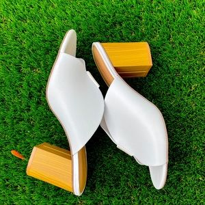 White and wooden mules